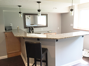 Basement kitchen and bar remodel with granite countertops in Rochester, Minnesota