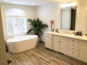 Master bathroom remodel with beautiful freestanding tub and vanity in Rochester, MN