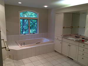 Master bath with old ugly white tiles before remodel was complete 