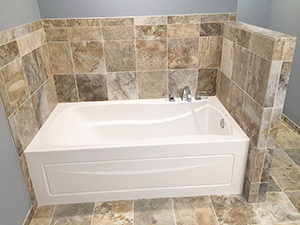 New bathtub with multi-color tile work in Rochester, Minnesota